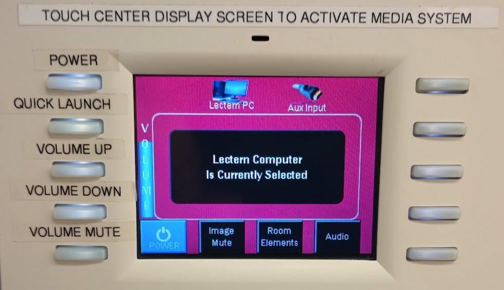 Touch panel with additional physical buttons that are labeled for their functions.