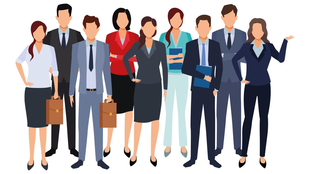 Assorted office professionals standing next to each other.