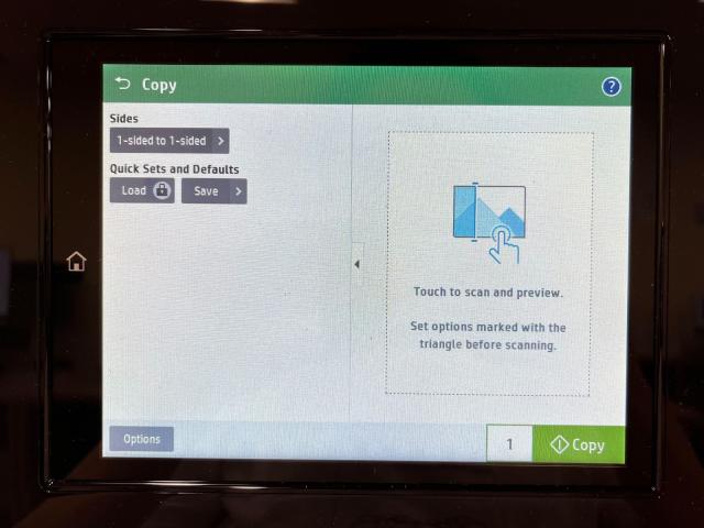 The copy options screen with options to change side settings and the scan and preview button.