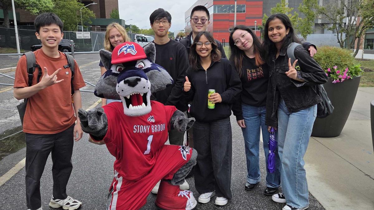 student techs with wolfie