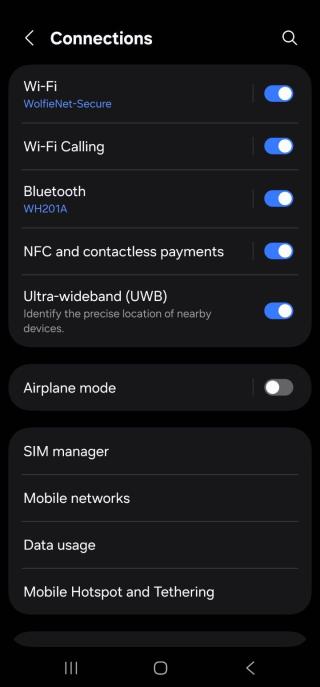 Screenshot of a smartphone Connections settings menu in dark mode, showing active connections to the WolfieNet-Secure Wi-Fi network.