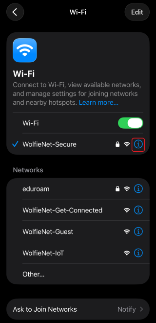 A screenshot of the Wi-Fi networks list on iPhone with the information button next to one circled.