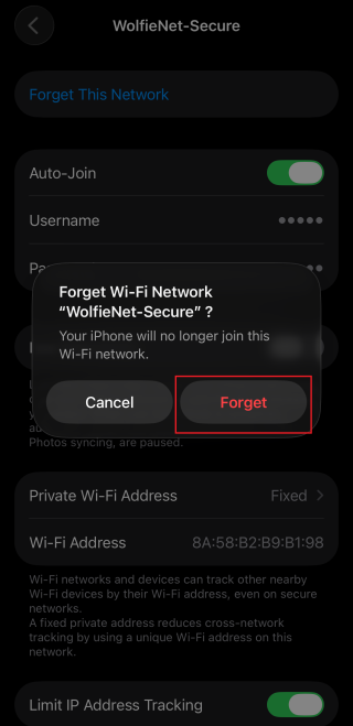 A screenshot of the Forget Network confirmation message on iPhone.